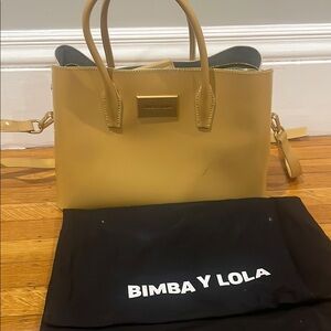 Bimba y Lola inside leather tan bag.